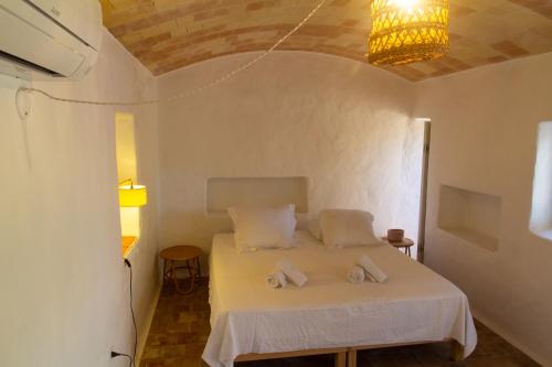 Ένα ή περισσότερα κρεβάτια σε δωμάτιο στο Casa Muro Luxury Villa