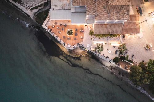 an aerial view of a house by the ocean at Panorama Inn in Lithakia