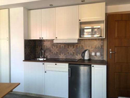 Dapur atau dapur kecil di pokoje gościnne u znajomej