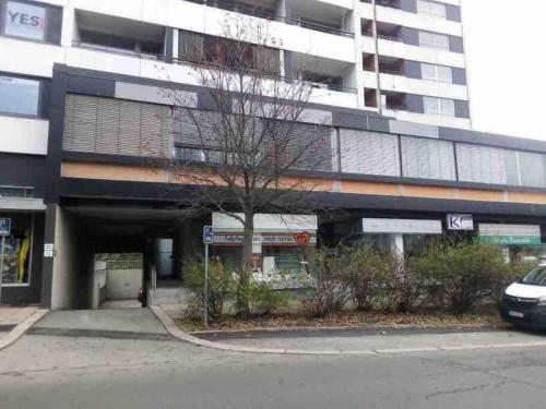 a building with a car parked in front of it at Apartment 55 I Cental Hof I WiFi I TV in Hof