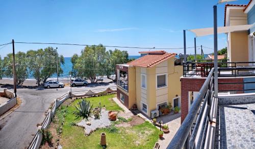 a view of a house with a yard at Edem in Vatera