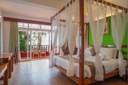 Cama o camas de una habitación en Tea Valley Resort, Munnar