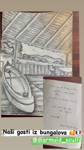 a pencil drawing of a room with a boat at Splav "Slap" - Bungalovi in Danilovgrad