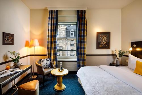 Katil atau katil-katil dalam bilik di Opera Hotel Zürich