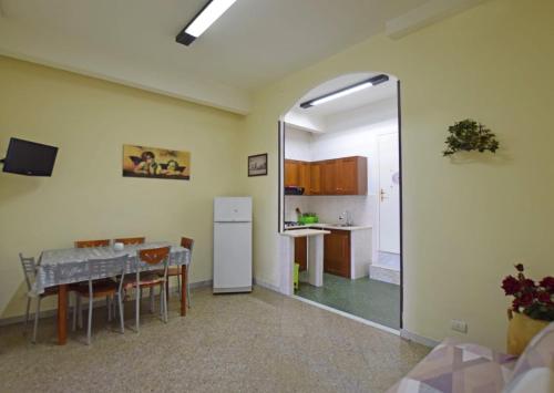 Kuchyň nebo kuchyňský kout v ubytování Les Suites Corso Roma