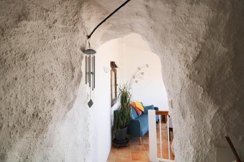 a hallway in a house with a stone wall at Marie à Callas in Callas
