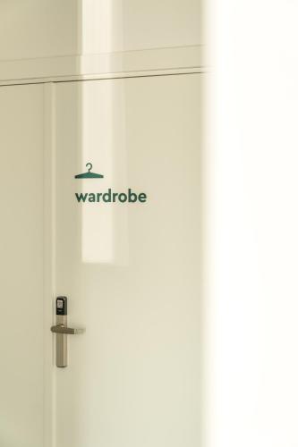 a glass door with the words warride on it at City Inn Lviv Smart Hotel in Lviv