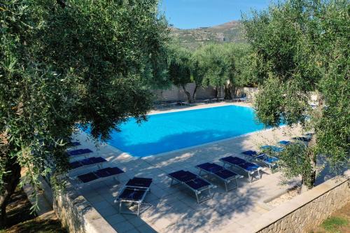 The swimming pool at or close to Holiday Apartment orchidea with swimming pool and private beach -3