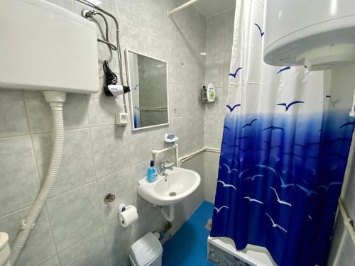 Vonios kambarys apgyvendinimo įstaigoje Central DELUXE Apartment