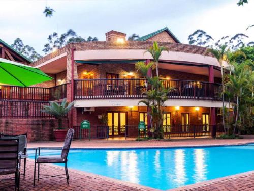 Πισίνα στο ή κοντά στο FamilyQuest Accommodation