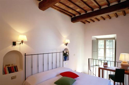 Ένα ή περισσότερα κρεβάτια σε δωμάτιο στο Villa Ducci