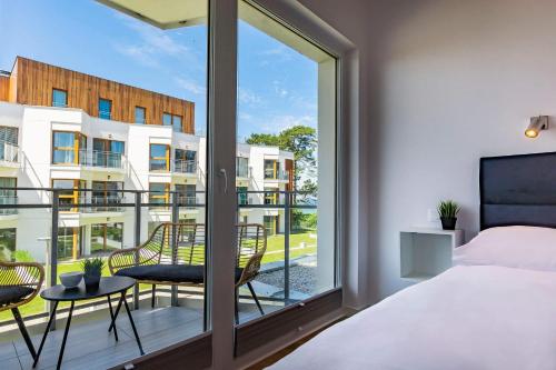 Posteľ alebo postele v izbe v ubytovaní VacationClub - Let’s Sea Baltic Park C79