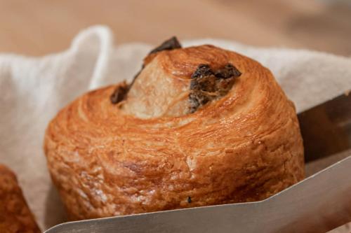 a loaf of bread sitting on a piece of paper at Esplanade Hotel in Diekirch