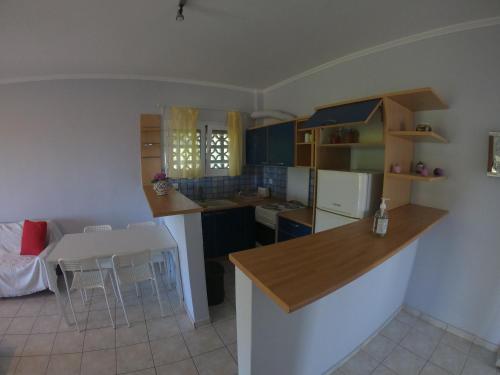 Η κουζίνα ή μικρή κουζίνα στο Mavretas Apartments 1
