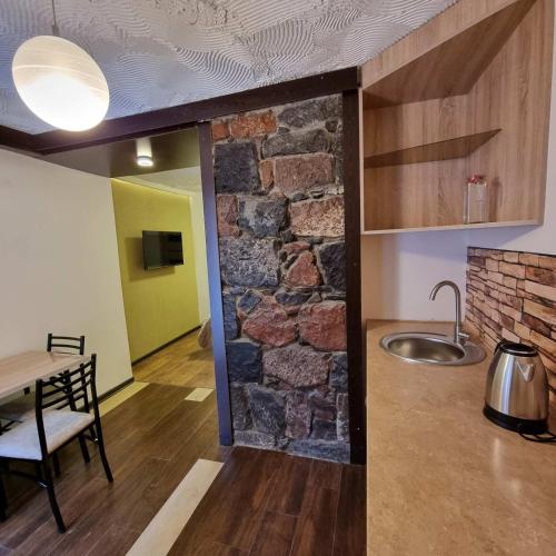 Kuchyň nebo kuchyňský kout v ubytování River House Boutique Hotel