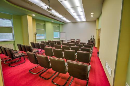 Der Geschäftsbereich oder Konferenzraum in der Unterkunft Hotel Ambient