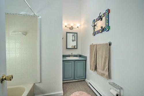 a bathroom with a sink and a shower at Picturesque Creekside Cabin - Hike and Fish! in Cuchara