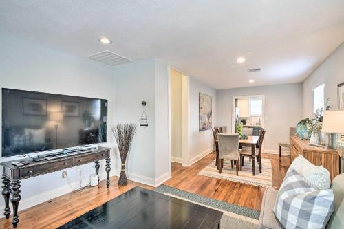 a living room with a large flat screen tv at about 1 Mi to Pier and Beaches! Family Home in Galveston in Galveston