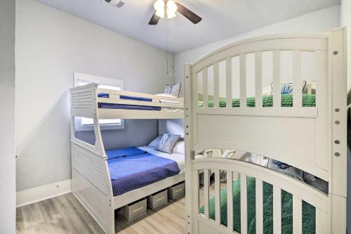 a bunk room with two bunk beds and a crib at about 1 Mi to Pier and Beaches! Family Home in Galveston in Galveston