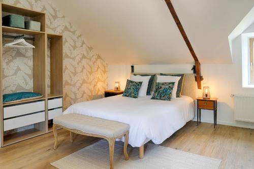 Łóżko lub łóżka w pokoju w obiekcie Chambre d’hôtes Douce Heure de Chêne