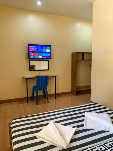 Μια τηλεόραση ή/και κέντρο ψυχαγωγίας στο Midnite Inn