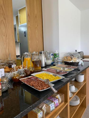 a kitchen counter with a tray of food on it at Quintinha Silvestre in Tondela