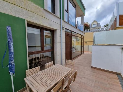 Billede fra billedgalleriet på Foz Playa Rapadoira - Bajos con terraza i Foz