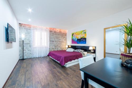 Posteľ alebo postele v izbe v ubytovaní Aparment Lila