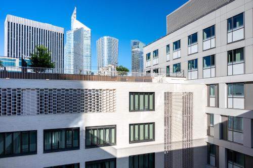 a view of the city from a building at Staycity Aparthotels Paris La Defense in Courbevoie