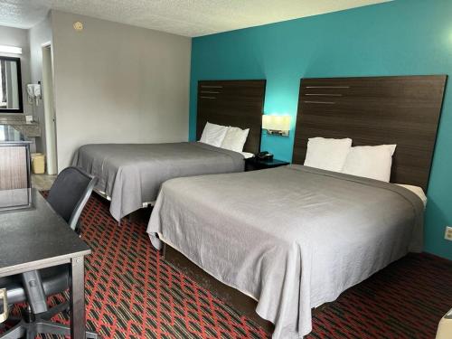 Katil atau katil-katil dalam bilik di Key West Inn - Tuscumbia