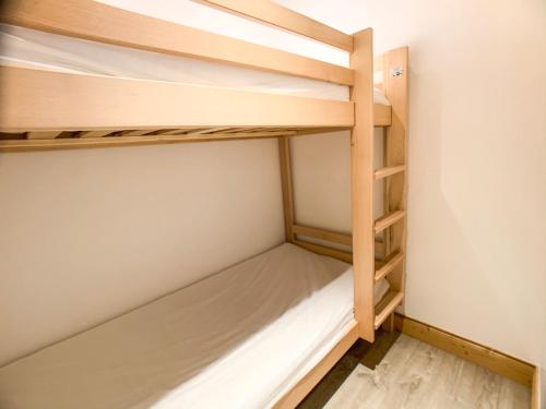 a small room with wooden bunk beds at Studio Tignes, 2 pièces, 4 personnes - FR-1-502-156 in Tignes