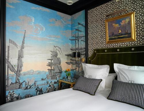 Posteľ alebo postele v izbe v ubytovaní Hotel Boutique Triana House