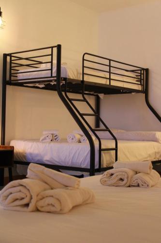 Ένα ή περισσότερα κρεβάτια σε δωμάτιο στο B&B Via Veneto
