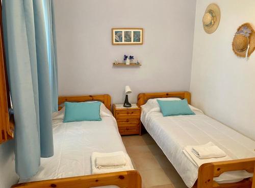 Postel nebo postele na pokoji v ubytování Pitsa's Rooms