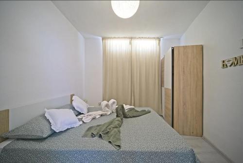 Giường trong phòng chung tại Apartment Vita