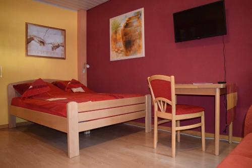 Postel nebo postele na pokoji v ubytování Gästezimmer Leonore