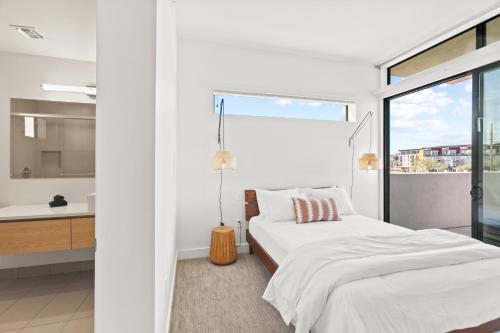 Кровать или кровати в номере Minnezona Apartments