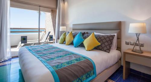 Postel nebo postele na pokoji v ubytování Dunes d'Or Ocean Club