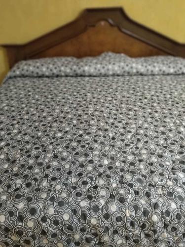 a close up of a pile of rings on a bed at HOTEL PREMIER RIOVERDE in Río Verde