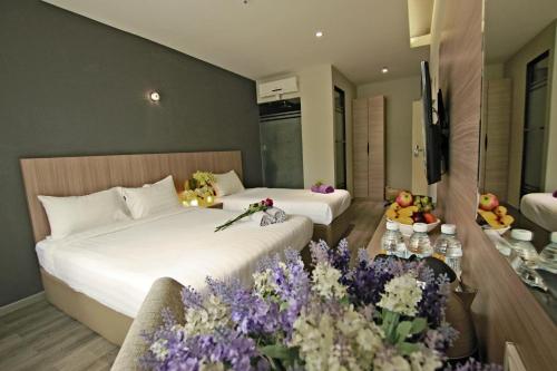 เตียงในห้องที่ Hotel 99 Kuala Lumpur City