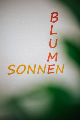 a close up of a sign with the words boston common at Karglhof Villa in Faak am See