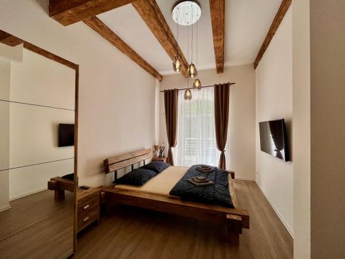 Postel nebo postele na pokoji v ubytování Apartmán Potůček