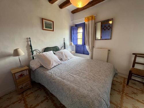 Кровать или кровати в номере Casa Blas