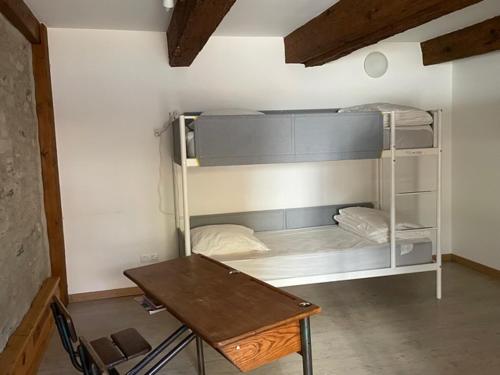 Posteľ alebo postele v izbe v ubytovaní Appt spacieux, charme de la pierre Catalane