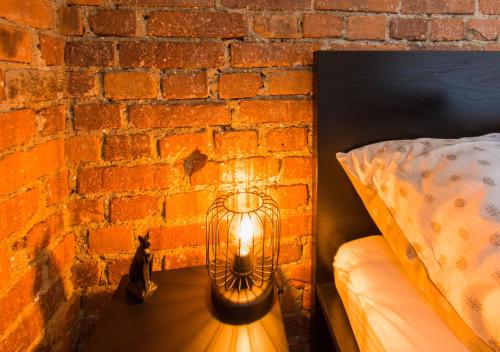 Posteľ alebo postele v izbe v ubytovaní Apartament Wita Stwosza