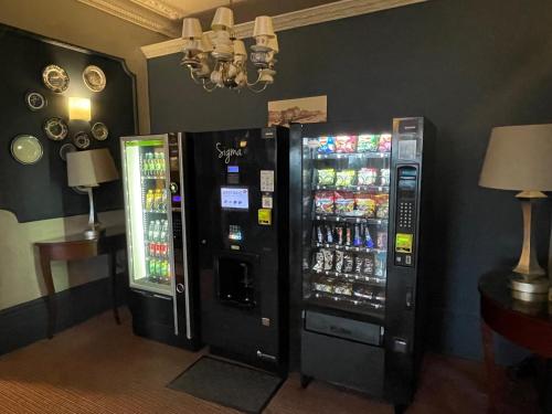 two vending machines sitting next to each other at West Rocks Townhouse in Eastbourne