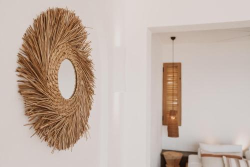a wreath hanging on a wall in a living room at Kalkan Han Hotel in Kalkan
