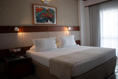 Postel nebo postele na pokoji v ubytování Mar Hotel Conventions
