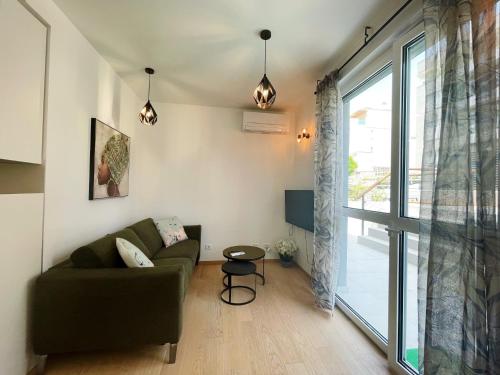 Cozy seaside apartment with private pool & terrace
