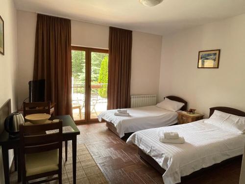 Cama o camas de una habitación en Gorska Vila Apartments